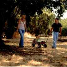 suzie and steve reynolds pulling cameron and rebecca in wagon