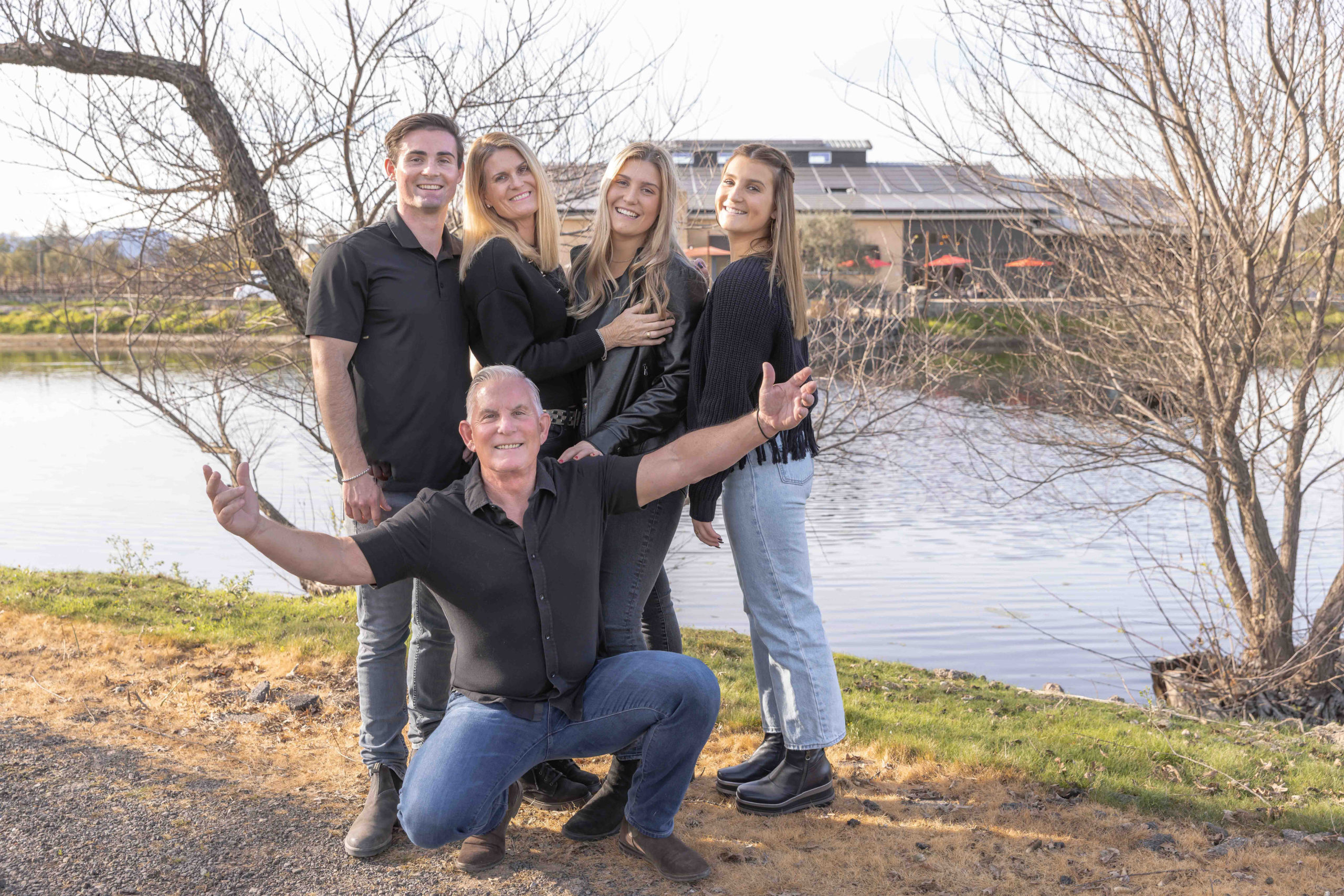 reynolds family smiling by pond