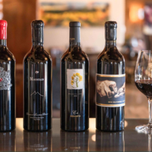 reynolds family reserve wines with glass on bar
